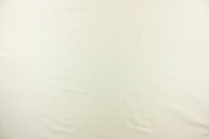 This taffeta fabric in a solid ivory. This fabric has a slight shine.  
