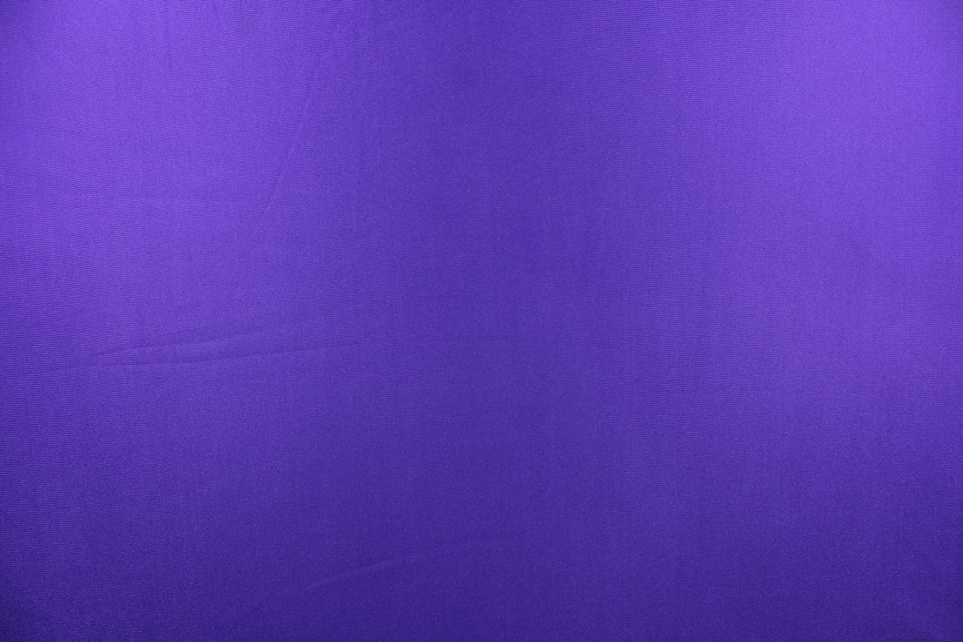 This fabric features a slight rib in a solid true purple.