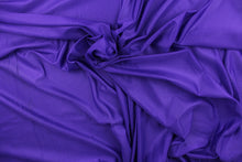 Load image into Gallery viewer, This fabric features a slight rib in a solid true purple.

