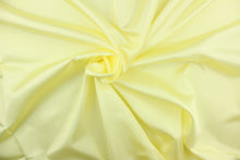 Load image into Gallery viewer, This taffeta fabric in solid yellow.
