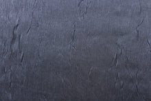 Load image into Gallery viewer, This taffeta fabric features a crinkle in iridescent in a dark gray blue . 
