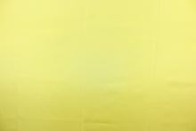 Load image into Gallery viewer, This taffeta fabric in solid bright yellow. 
