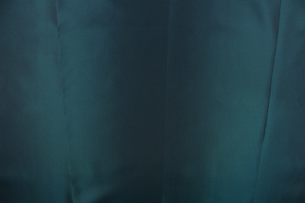 This taffeta fabric in iridescent in a deep teal