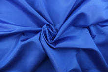 Load image into Gallery viewer, This bengaline faille fabric in a solid royal blue. This fabric has a slight shine and a slight ribs in the weft. 
