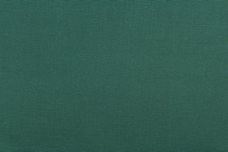This bengaline faille fabric in a solid dark green. This fabric has a slight shine and a slight ribs in the weft. 