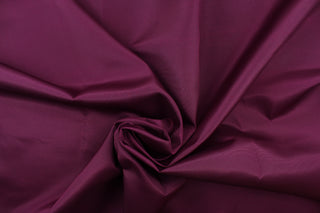  This bengaline faille fabric in a solid deep burgundy or marron. This fabric has a slight shine and a slight ribs in the weft