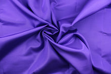 Load image into Gallery viewer, This bengaline faille fabric in a solid violet purple. This fabric has a slight shine and a slight ribs in the weft.

