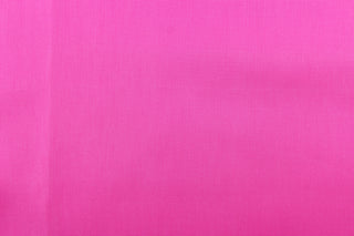 This taffeta fabric in solid hot pink.