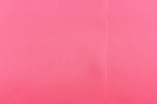 This taffeta fabric in solid bright pink . 