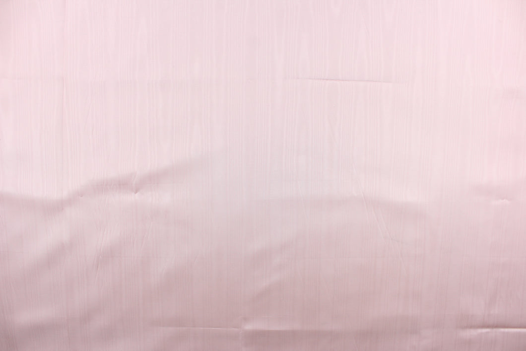 This taffeta fabric in a solid pink. This fabric has a slight shine and a wavy, watery look.
