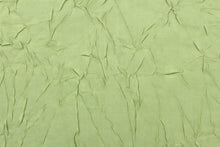 Load image into Gallery viewer,  This taffeta fabric features a crinkle in iridescent apple green. 
