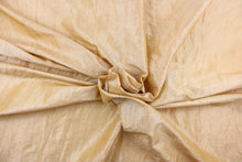 Load image into Gallery viewer, This taffeta fabric features a crinkle in iridescent light gold.
