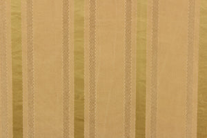 This stunning yarn dyed fabric features a striped pattern in varying shades of gold. Enhancing the various colors of the stripes is a slight sheen.