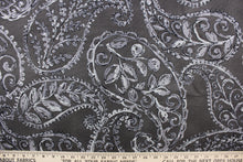 Load image into Gallery viewer, This fabric features a leaf design in gray and black against a dark gray background .
