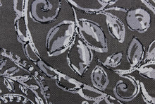 Load image into Gallery viewer, This fabric features a leaf design in gray and black against a dark gray background .
