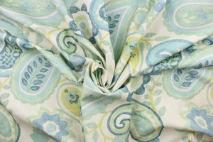 This fabric features a floral paisley design in turquoise, seafoam green, lime green, blue, teal, and natural. 