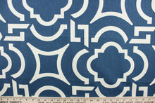 Load image into Gallery viewer,  This fabric features a geometric design in blue and white .
