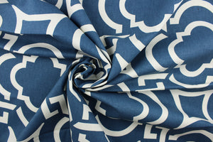  This fabric features a geometric design in blue and white .