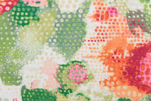 Load image into Gallery viewer, This fabric features a floral design in bright orange, pink, peach, green, hot pink, lime green, and white. 
