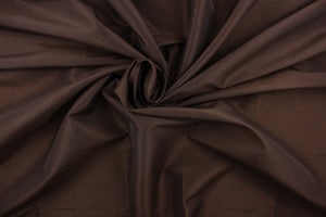  A mock linen fabric in a solid dark brown.