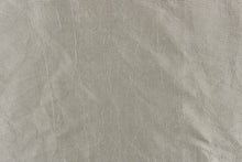 Load image into Gallery viewer, This taffeta fabric features a crinkle design in vibrant silver.

