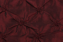 Load image into Gallery viewer, This beautiful fabric features an embroider gathered design in a iridescent deep red with black undertones .
