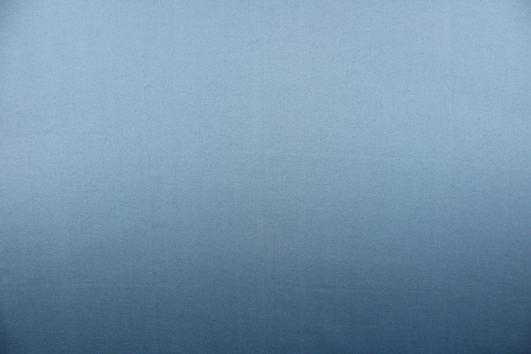  This beautiful versatile fabric offers a slight sheen in a solid blue. 