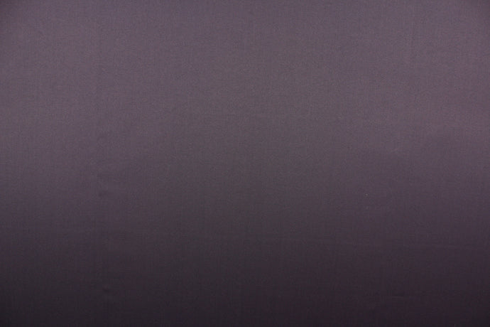 This beautiful versatile fabric offers a slight sheen in a solid rich gray purple.