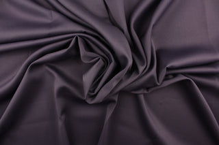  This beautiful versatile fabric offers a slight sheen in a solid rich gray purple.