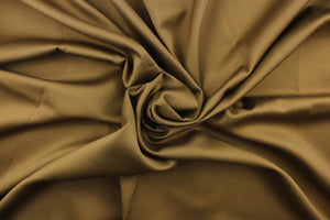 This beautiful versatile fabric offers a slight sheen in a solid rich olive green.
