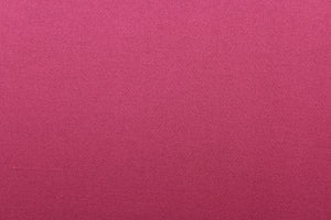 This beautiful versatile fabric offers a slight sheen in a solid rich deep pink. 