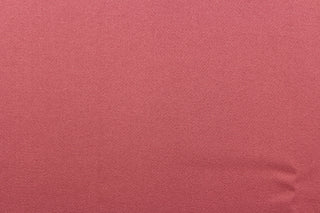 This beautiful versatile fabric offers a slight sheen in a solid mauve color.