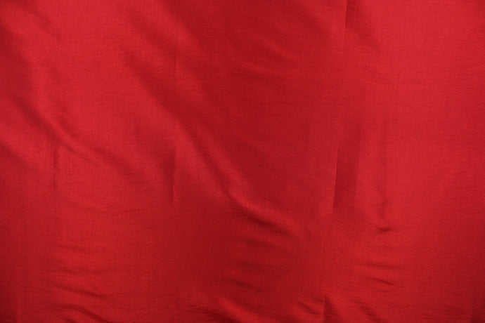 This taffeta fabric in a solid rich red.