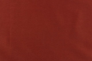 This taffeta fabric in a solid rich reddish brown.