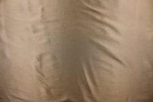 Load image into Gallery viewer, This taffeta fabric in an iridescent tan color. 
