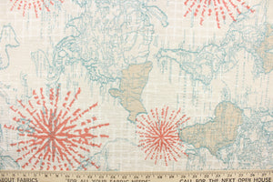 This chenille fabric features a world map with an oversized compass in blue, coral and off white