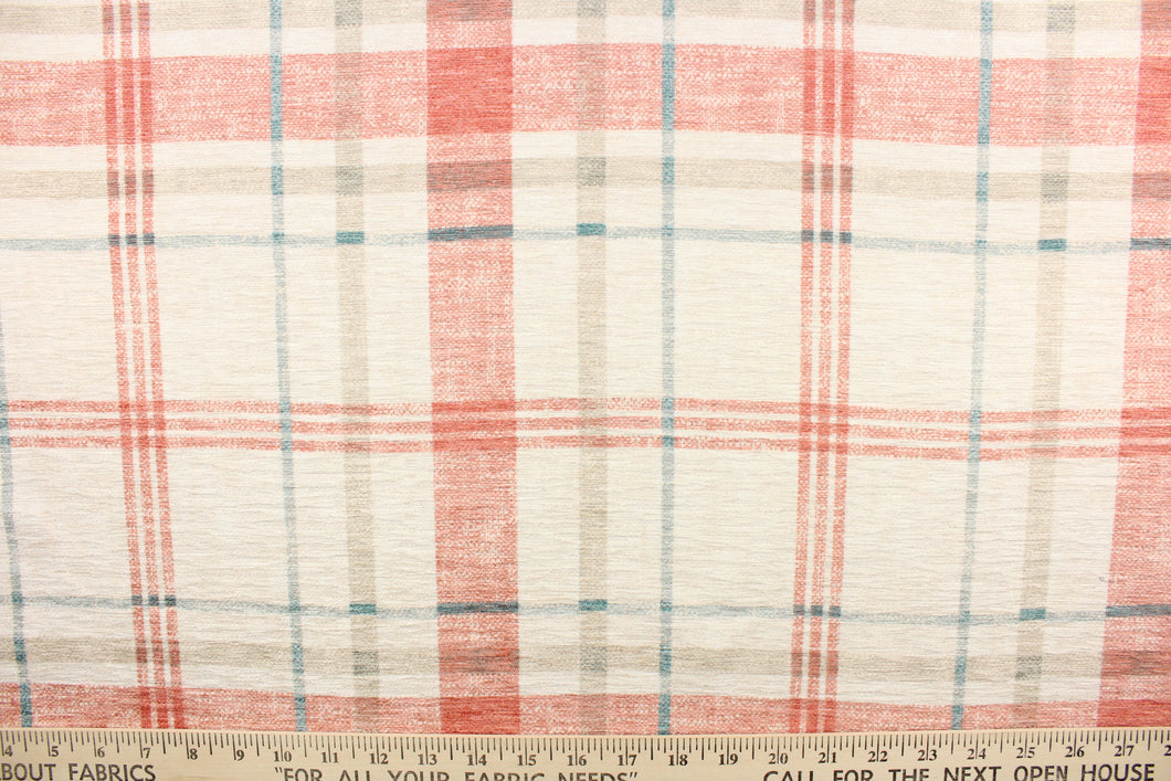 This velvet chenille fabric features a plaid design in coral pink, blue, cream, and a grayish khaki