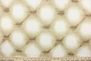 This fabric features a geometric design in shade of brown and white