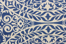 Load image into Gallery viewer, This fabric features medallion design in indigo blue and natural.
