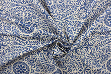 Load image into Gallery viewer, This fabric features medallion design in indigo blue and natural.
