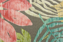 Load image into Gallery viewer,  This outdoor fabric features a floral design in green, turquoise, khaki, beige, pink, and off white against a taupe background.
