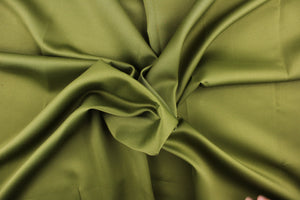 This beautiful versatile fabric offers a slight sheen in a solid olive green.