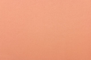 This beautiful versatile fabric offers a slight sheen in a solid coral.