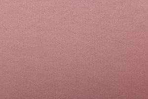 This beautiful versatile fabric offers a slight sheen in a solid light mauve. 