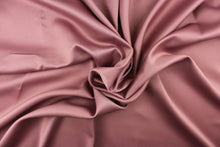 Load image into Gallery viewer, This beautiful versatile fabric offers a slight sheen in a solid light mauve. 
