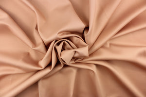 This beautiful versatile fabric offers a slight sheen in a solid clay.