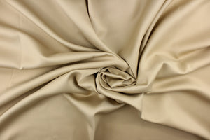 This beautiful versatile fabric offers a slight sheen in a solid true khaki. 