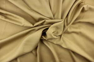 This beautiful versatile fabric offers a slight sheen in a solid rich khaki. 
