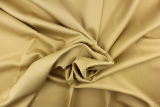 This beautiful versatile fabric offers a slight sheen in a solid golden khaki. 
