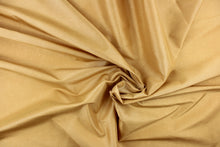 Load image into Gallery viewer, This beautiful jacquard fabric features an embroider pin head design in a golden tan.
